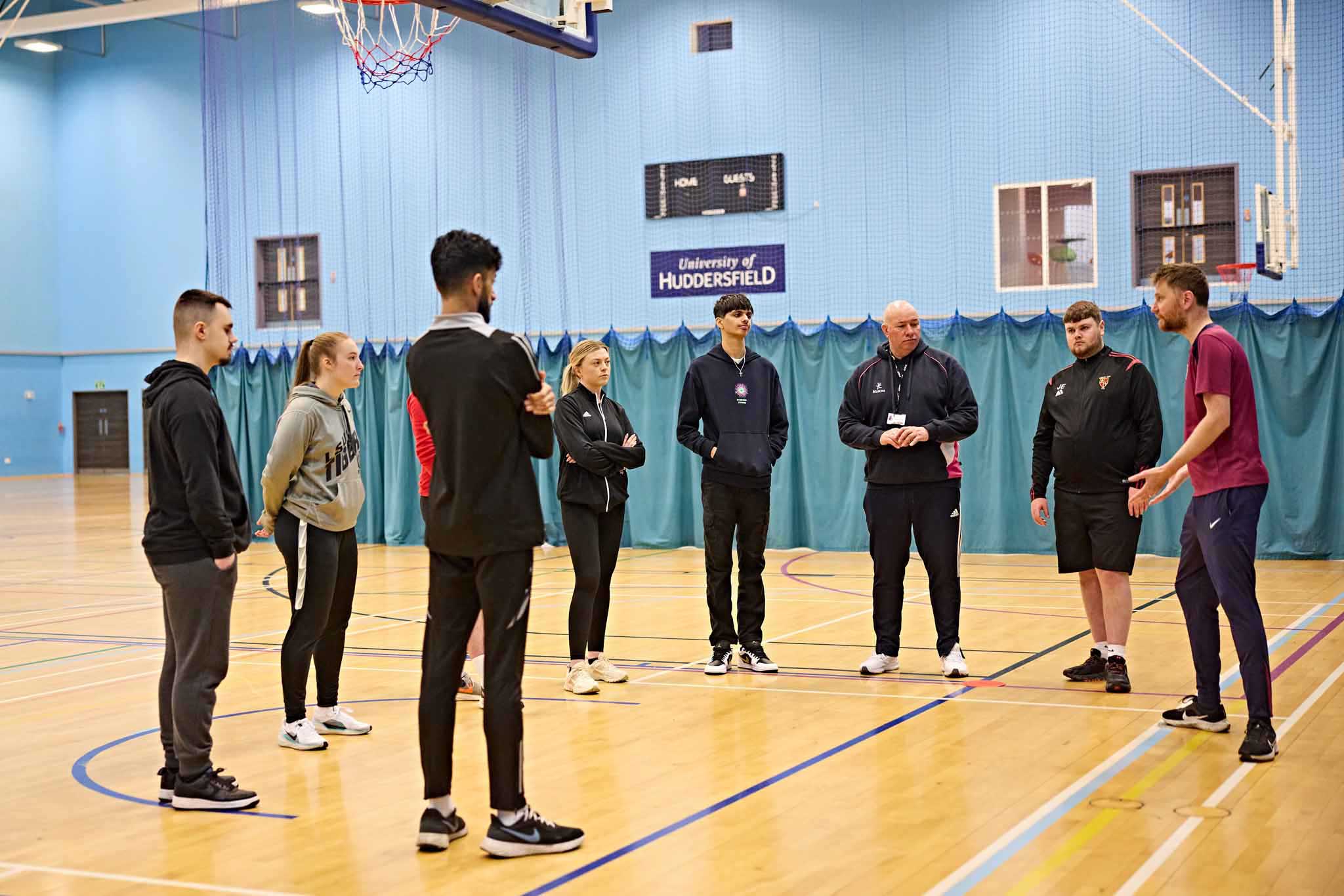 A sports lesson in a basketball course