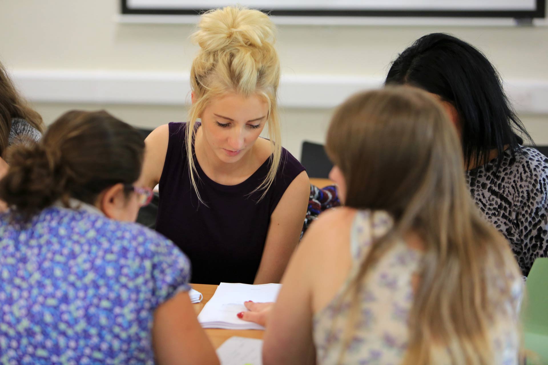 Students discussing work