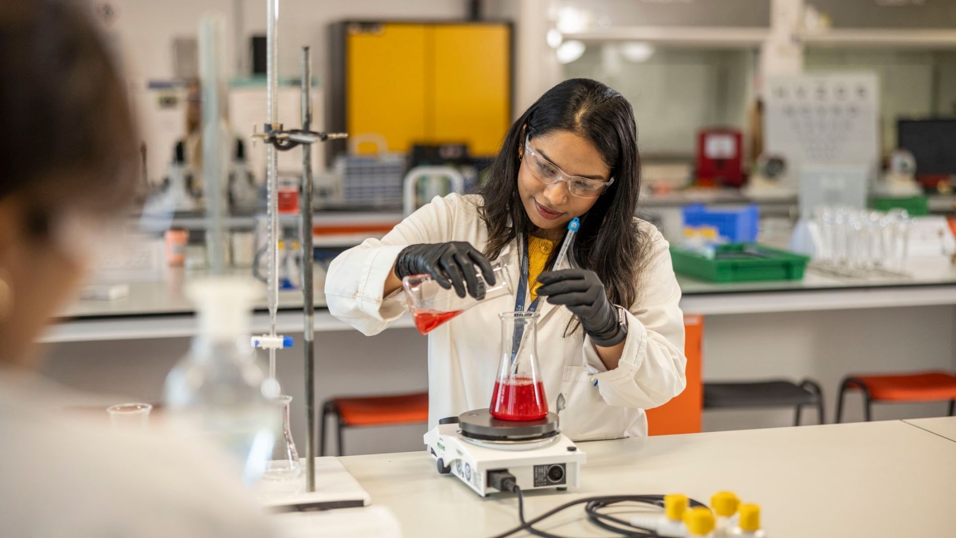 Student working with medical equipment in the lab