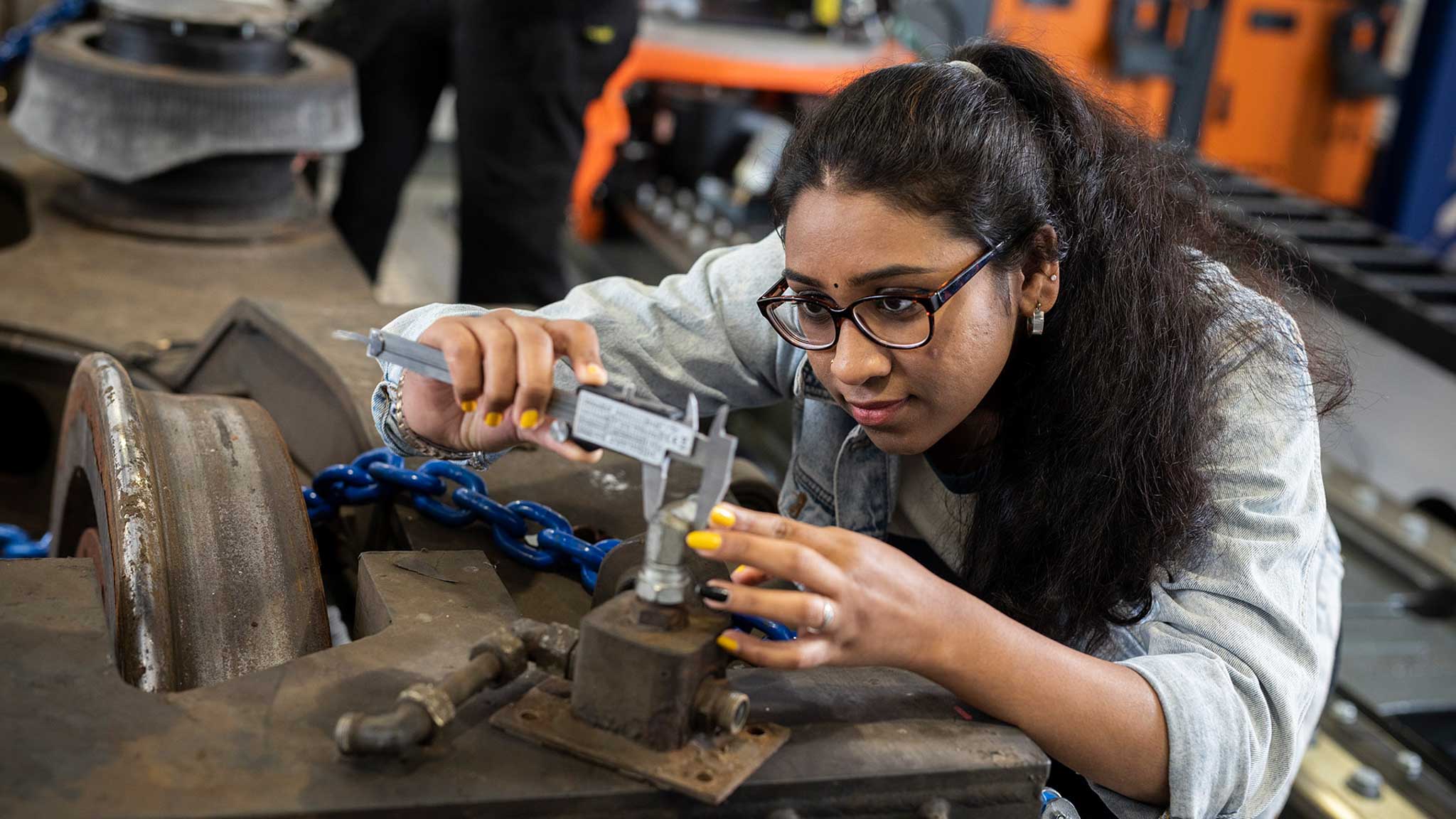Placement student working in a mechanical workshop