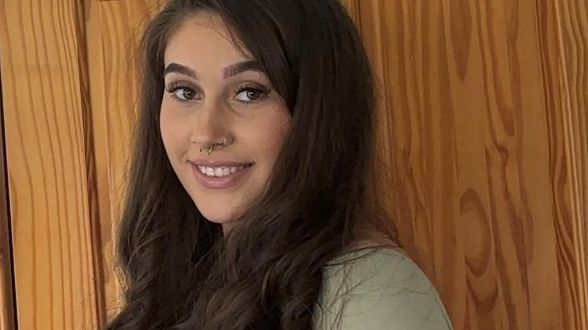 Headshot of Tayler.