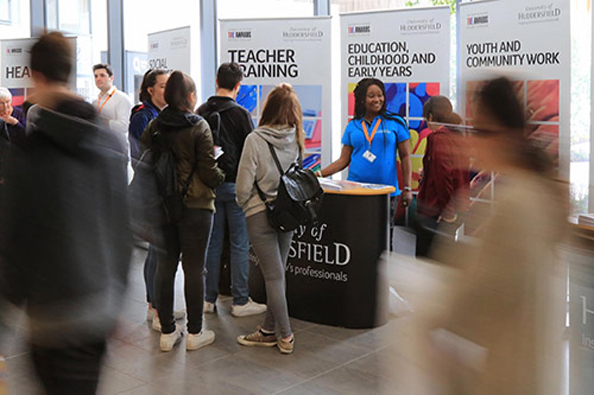 Student ambassadors helping potential students at an Open Day.
